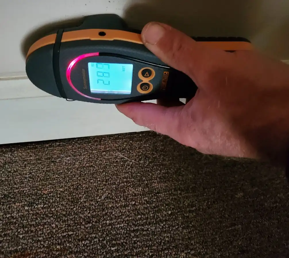 Moisture detection at baseboard during Burst Pipe Cleanup in Beebe